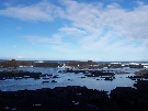 The rock pools at North Head Beach during high-tide