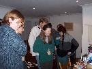 Jackie, Eduard and Anna looking at a chocolate web-site