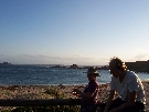 Charlotte and Brandon enjoying an al fresco dinner at Northhead beach