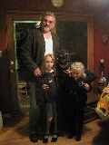 Hermione (Elsa), her dad, and kitties Carolyn and Annelise.