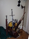The armory: Swords, axe, shield, leather-armour, Rohirhim helmet and elven bow and arrows
