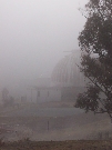 The burnt-out 74inch dome can just barely be seen through the fog.